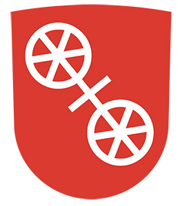 Das Stadtwappen von Mainz zeigt zwei durch ein Kreuz verbundene Räder.